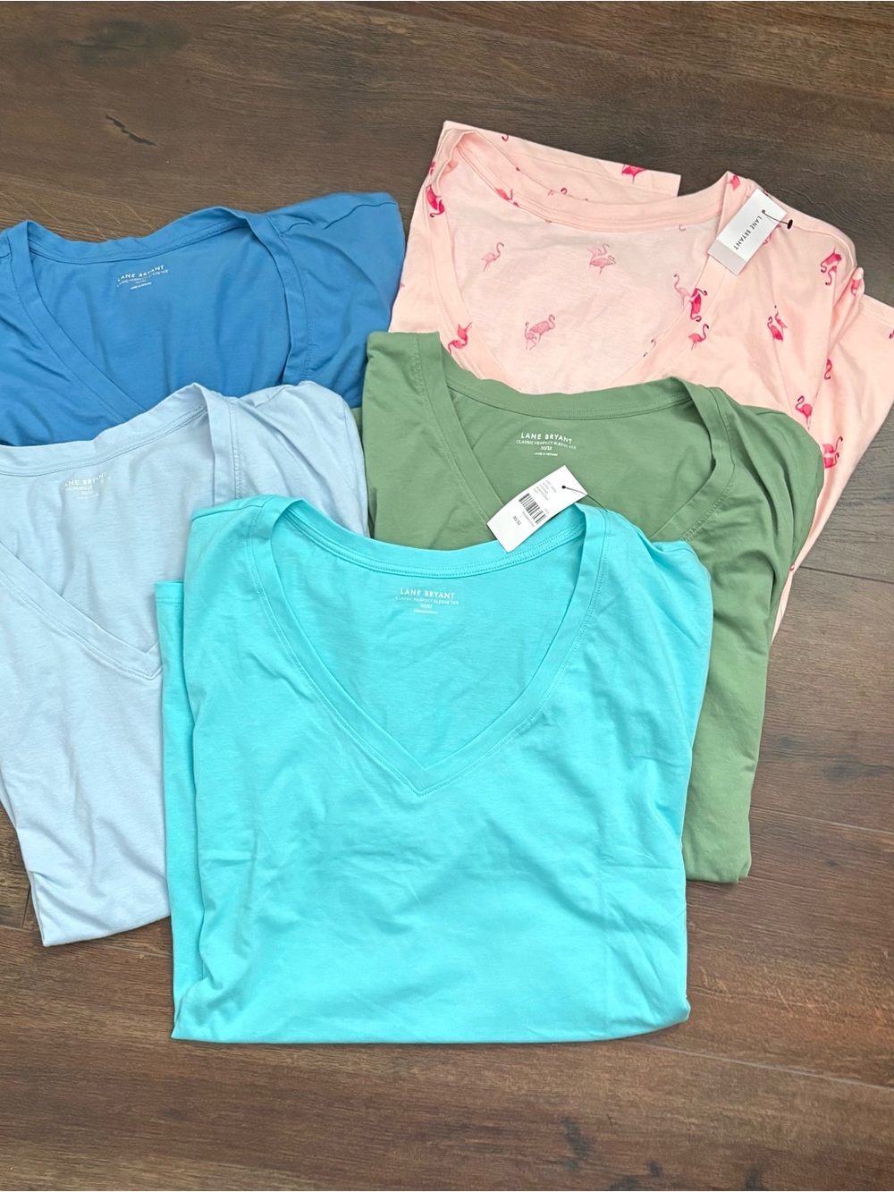 Lane Bryant V-Neck Tee Pack in Aqua, Sky, Blue, Olive & Pink Flamingo Mix